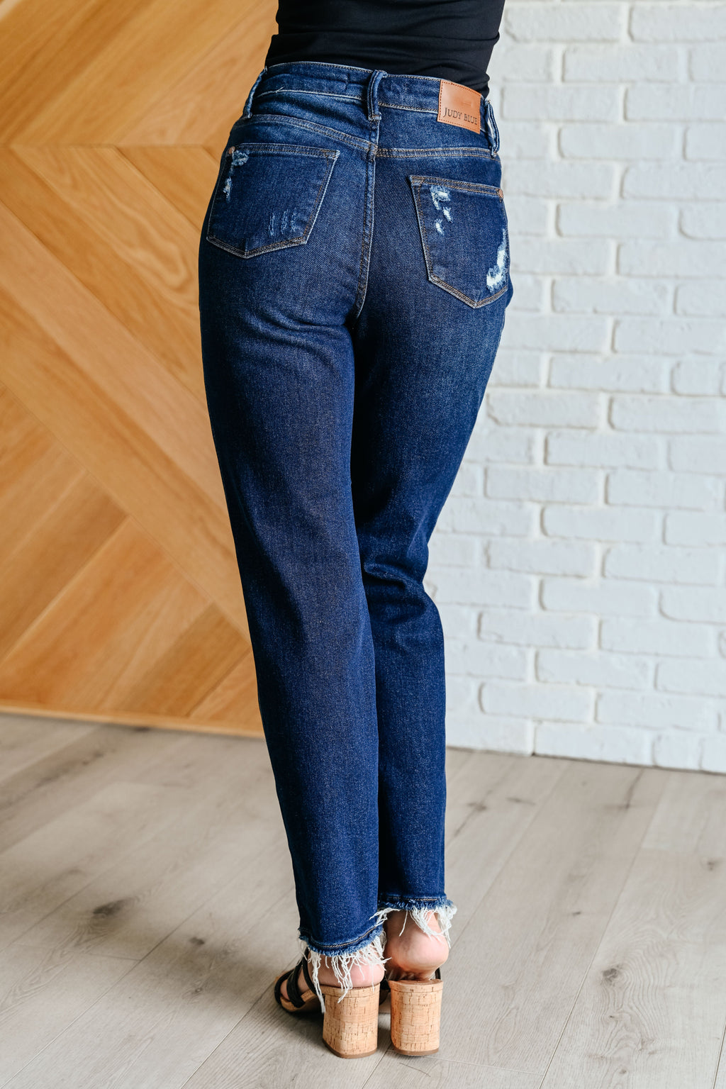 The Montana High Rise Rigid Magic Distressed Straight Jean