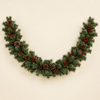 Real-touch artificial green pine garland with berry clusters and pine cones on an ivory background