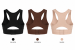 Sports bra shown in black, brown, and nude color options